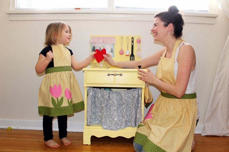 Writer Madeleine Somerville poses with her daughter. She says we have to reduce consumption if we care about the environment, even if it means raising a child without using paper towels and other disposable cleaning products. Photo courtesy of Madeleine Somerville. 