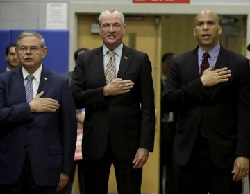 U.S. Sen. Bob Menendez, left, New Jersey Gov. Phil Murphy and Sen. Cory Booker attend an event kicking off Menendez's campaign for re-election at Union City High School, Wednesday, March 28, 2018, in Union City, N.J. (AP Photo/Julio Cortez)