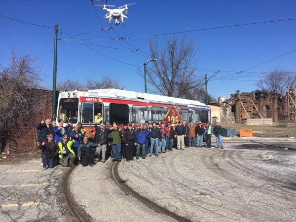 A group photo of all attendees, via drone.