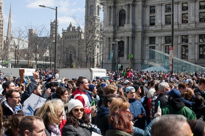 Thousands gathered around City Hall at the end of the parade route for the NCAA Champion Villanova WIldcats Thursday morning. (Brad Larrison for WHYY)