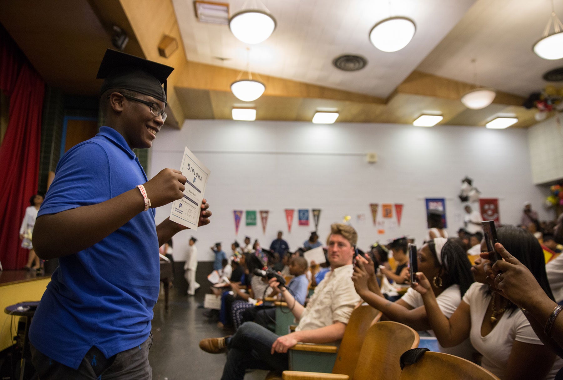 Malachi Oduardo, 11, at the fifth-grade graduation ceremony. (Lindsay Lazarski/WHYY)