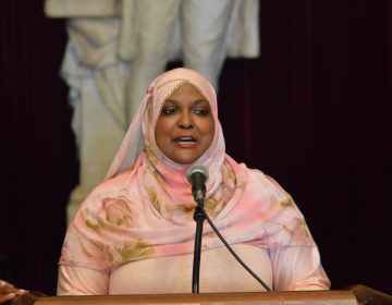 Stephanie Ali talks to those assembled at Philadelphia's City Hall at a ceremony honoring social workers. (Tom MacDonald/WHYY)