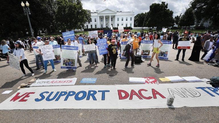 Supporters of Deferred Action for Childhood Arrivals program (DACA), demonstrate on Pennsylvania Avenue in front of the White House in Washington, D.C., on Sept. 3, 2017. A federal judge on Tuesday became the third judge to rule against the administration's plans to end DACA after federal judges in California and New York handed down similar decisions.