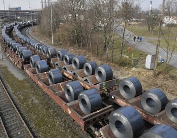Steel coils sit on wagons leaving a factory in Duisburg, Germany on March 2. U.S. President Trump Monday decided to hold off on imposing most steel and aluminum tariffs until at least June 1