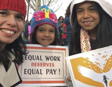 A federal court has sided with Aileen Rizo, who filed suit after realizing her male counterparts were being paid more. The ruling overrules a previous interpretation of the 1963 Equal Pay Act. Rizo is seen here with her daughters in a photo she provided to the AP in 2017. (Aileen Rizo/AP)