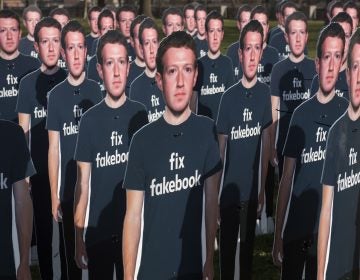 Cardboard cutouts of Facebook founder and CEO Mark Zuckerberg stand outside the U.S. Capitol in Washington as he testified before a Senate panel last week. (Kevin Wolf/AP)
