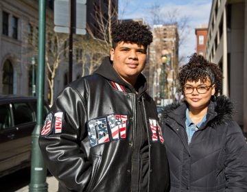 Puerto Rican evacuees Crisjoel Morales Monet, 17, and Judy Morales Monet, 16, are staying at the Holiday Inn Express in Center City with their mom and oldest brother Friday April 20th. They still don't know where to go next. (Kimberly Paynter/WHYY)