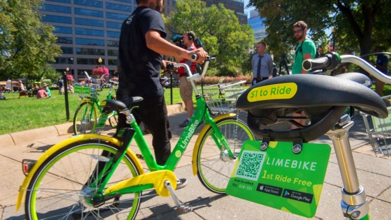 A man rides a LimeBike in Washington, DC. (AFP/Getty Images)