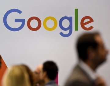 People pass by the Google logo at the Web Summit in Lisbon on Nov. 8. Europe's new data privacy rules go into effect May 25. (Patricia De Melo Moreira/AFP/Getty Images) 