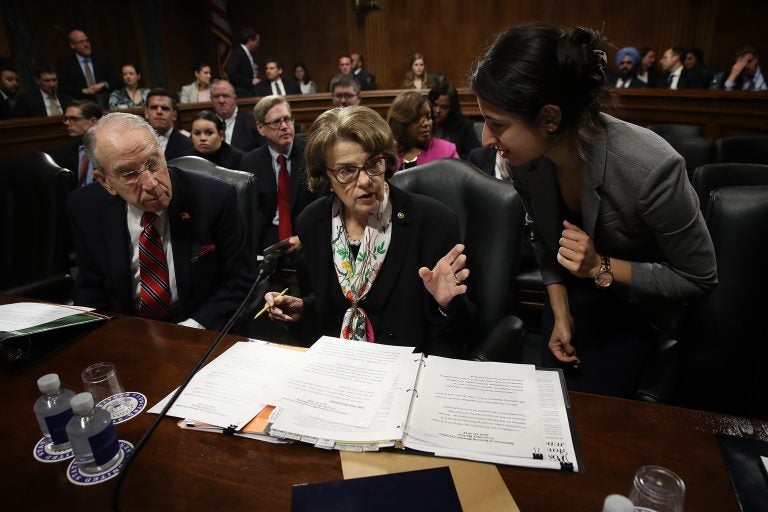 Senate Judiciary Committee Chairman Chuck Grassley confers with ranking member Dianne Feinstein at a committee hearing on April 19. The committee has approved legislation to protect special counsel Robert Mueller's investigation. (Win McNamee/Getty Images)