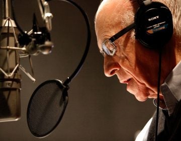 NPR's Carl Kasell delivers one of his last newscasts during Morning Edition on Dec. 30, 2009 in Washington, D.C