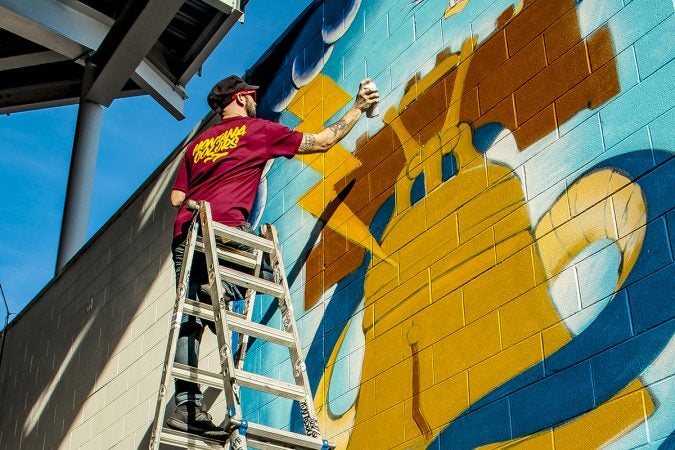 Glossblack is shown replicating a tattoo design for Philadelphia Union Soccer at Talen Energy Stadium in Chester, Pennsylvania. (Image courtesy of Glossblack)