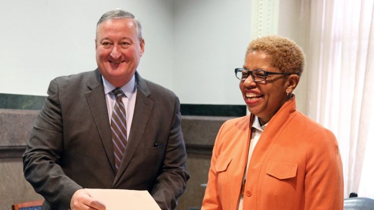 Pictured in this WHYY file photo are Mayor Jim Kenney and Joyce Wilkerson. Both Wilkerson and Christopher McGinley  (not pictured) were today named to the 9 member Philadelphia School Board. (WHYY, file)