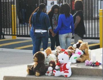 Grieving students made a shrine of teddy bears outside Howard High School of Technology in Wilmington after Amy Joyner-Francis died there in April 2016 after being attacked by classmates in the bathroom. (File/WHYY) 