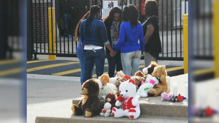 Grieving students made a shrine of teddy bears outside Howard High School of Technology in Wilmington after Amy Joyner-Francis died there in April 2016 after being attacked by classmates in the bathroom. (File/WHYY) 