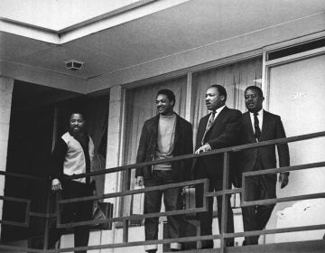 Martin Luther King Jr. stands with fellow civil rights leaders on the balcony of the Lorraine Motel in Memphis, Tenn., on April 3, 1968 -- one day before he was assassinated while standing in approximately the same place. From left are Hosea Williams, Jesse Jackson, King and Ralph Abernathy.