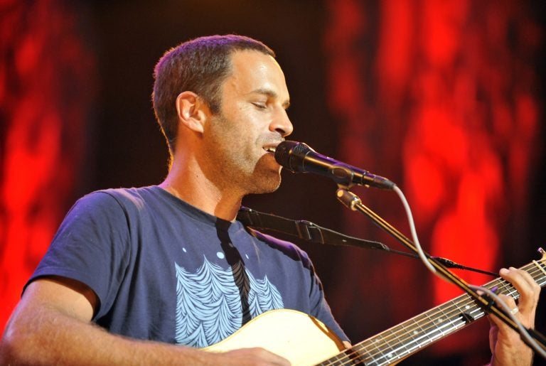 Jack Johnson performs with his band during the Farm Aid 2013 concert at Saratoga Performing Arts Center in Saratoga Springs, N.Y., Saturday, Sept. 21, 2013. (Photo: Hans Pennink/AP)