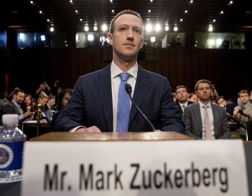 Facebook CEO Mark Zuckerberg arrives to testify before a joint hearing of the Commerce and Judiciary Committees on Capitol Hill in Washington, Tuesday, April 10, 2018, about the use of Facebook data to target American voters in the 2016 election. (AP Photo/Andrew Harnik)