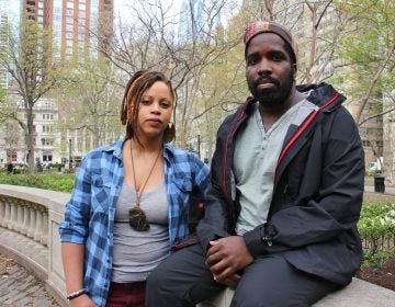 Shani Akilah and Abdul-Aliy Muhammad with the Black and Brown Workers Cooperative at Rittenhouse Square Park. (Emma Lee/WHYY)