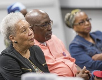 Audience members listen to speakers at event about Malcolm X. (Jonathan Wilson for WHYY)