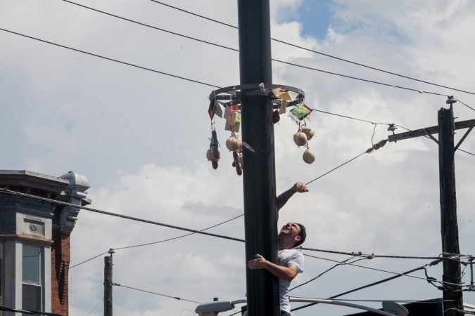 Greased pole climbing in Philly: Why we do it and why we love it