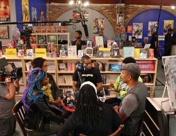 Black coffee shop owners gather for a live-streamed conversation about retail racism and supporting black businesses at Amalgam Comics and Coffeeshop in Kensington. Participating are (clockwise from left) Amalgam owner Ariell Johnson, owner of Franny Lou's Porch Blew MaryWillow, activist Mark Lamont Hill, Shantrell P. Lewis of Shoppe Black, Keba Konte of Red Bay Coffee, and activist Pam Africa.
