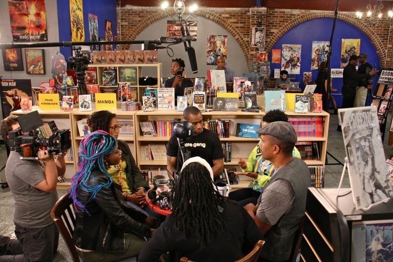 Black coffee shop owners gather for a live-streamed conversation about retail racism and supporting black businesses at Amalgam Comics and Coffeeshop in Kensington. Participating are (clockwise from left) Amalgam owner Ariell Johnson, owner of Franny Lou's Porch Blew MaryWillow, activist Mark Lamont Hill, Shantrell P. Lewis of Shoppe Black, Keba Konte of Red Bay Coffee, and activist Pam Africa.