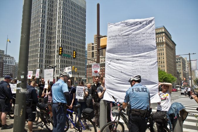 The local chapter of Jewish Voice for Peace protested the raising of the flag of Israel at City Hall in Philadelphia Monday. (Kimberly Paynter/WHYY)