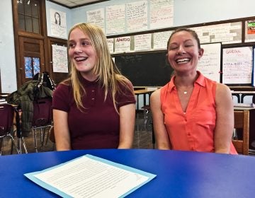 8th grade student Kristina Kelly and English teacher Monique Traugerat Thomas K. Finletter Academics Plus School in the Olney section of North Philadelphia. (Kimberly Paynter/WHYY)