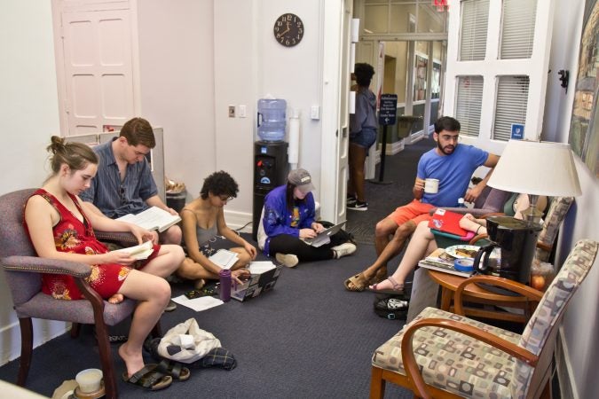 Swarthmore students sit outside the office of Liz Braun, dean of students. (Kimberly Paynter/WHYY)