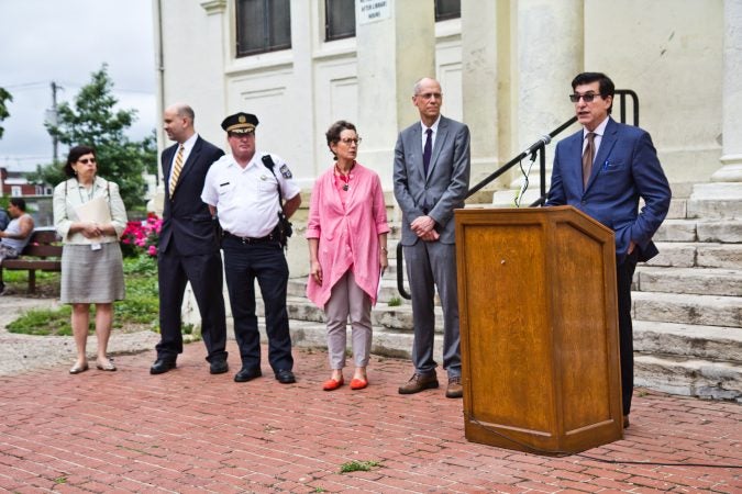 Philadelphia Managing Director Michael DiBerardinis and other city officials brief the press on the progress of the homeless encampment cleanup. (Kimberly Paynter/WHYY)