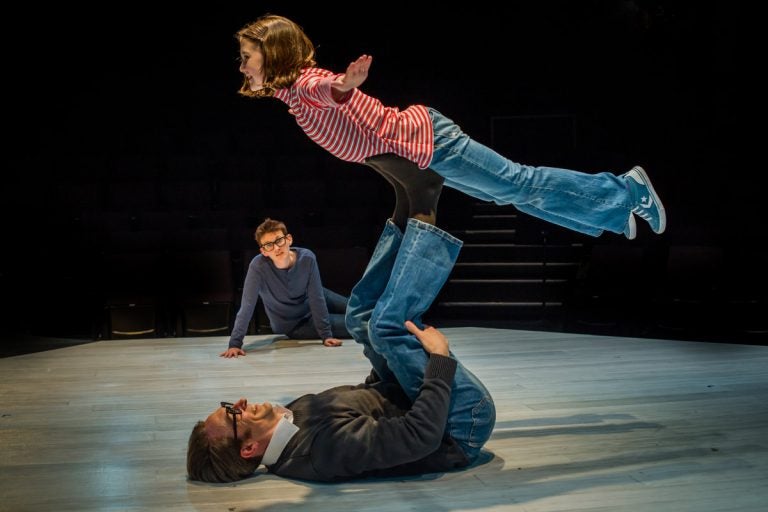 Ben Dibble balances Kate Bove, as Mary Tuomanen looks on, in Arden Theatre Company's production of 