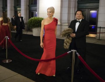 In this Thursday, Jan. 19, 2017 file photo, President-elect Donald Trump adviser Kellyanne Conway, accompanied by her husband, George, speaks with members of the media as they arrive for a dinner at Union Station in Washington, the day before Trump's inauguration. (Matt Rourke/AP Photo)