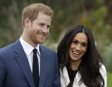 Britain Royal Engagement Britain's Prince Harry and his fiancee Meghan Markle pose for photographers during a photocall in the grounds of Kensington Palace in London, Monday Nov. 27, 2017.