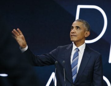 Former U.S. President Obama gestures as he arrives on stage prior to delivering a speech, in Paris, Saturday, Dec. 2, 2017.  Former U.S. President Barack Obama is ending a five-day international trip in Paris, where he is lunching with French President Emmanuel Macron and scheduled to give a speech to business leaders. (Thibault Camus/AP Photo)