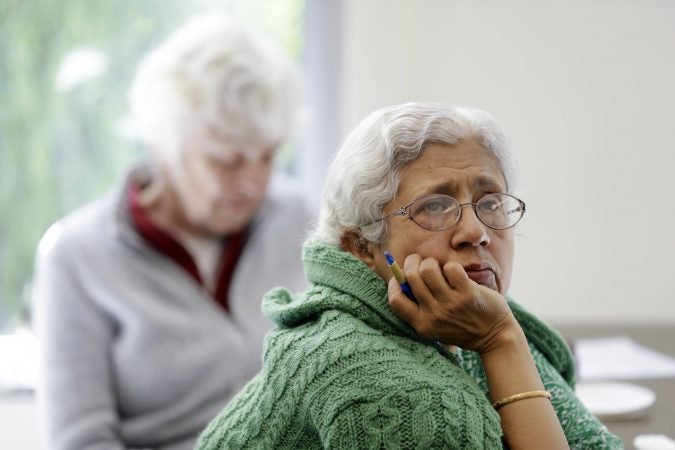 In this Friday, April 13, 2018 photo, Sara Dhamija, (right), listens to a teacher during an anti-bullying class at the On Lok 30th Street Senior Center in San Francisco. Nursing homes, senior centers and housing complexes for the elderly have introduced programs, training and policies aimed at curbing spates of bullying, an issue once thought the exclusive domain of the young. (Marcio Jose Sanchez/AP Photo)