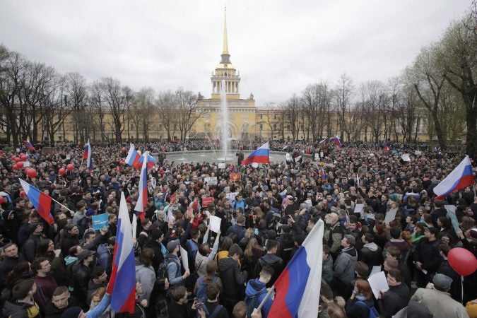 Protesters attend a rally in St. Petersburg, Russia, Saturday, May 5, 2018. Alexei Navalny, anti-corruption campaigner and Putin's most prominent critic, called for nationwide protests on Saturday, two days ahead of the inauguration of Vladimir Putin for a fourth term as Russian president. (Dmitri Lovetsky/AP Photo)