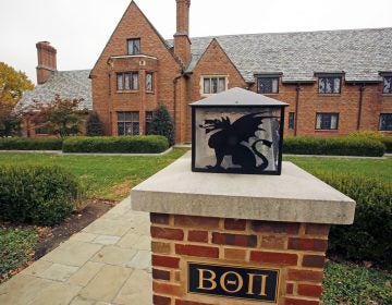 FILE – This Nov. 9, 2017, file photo shows Pennsylvania State University's shuttered Beta Theta Pi fraternity house in State College, Pa. Centre County, Pa.,(AP Photo/Gene J. Puskar, File)