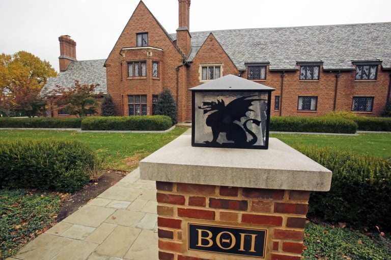 FILE – This Nov. 9, 2017, file photo shows Pennsylvania State University's shuttered Beta Theta Pi fraternity house in State College, Pa. Centre County, Pa.,(AP Photo/Gene J. Puskar, File)