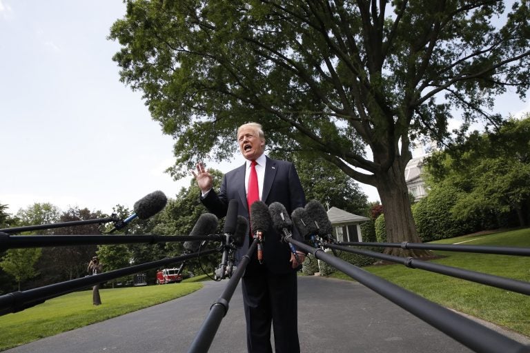 President Donald Trump speaks to the media on the South Lawn of the White House in Washington, Wednesday, May 23, 2018, en route to a day trip to New York.   Trump will hold a roundtable discussion on Long Island on illegal immigration and gang violence that the White House is calling a 