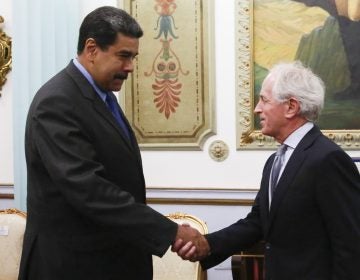 In this photo released by the Miraflores Presidential Press Office, Venezuela's President Nicolas Maduro, left, shakes hands with Republican Senator Bob Corker during a meeting at the Miraflores Presidential Palace in Caracas, Venezuela, Friday May 25, 2018. The Chairman of Senate Foreign Relations Committee met with Venezuelan President Nicolas Maduro two days after the embattled socialist leader kicked out the top U.S. diplomat in the country. There was no immediate comment from Republican Senator Bob Corker's office about the nature of the surprise visit. (Miraflores Presidential Press Office via AP)