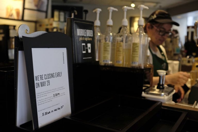 A store closing sign for May 29 is posted at a pickup counter at a Starbucks store, Friday, May 25, 2018, in Chicago. Starbucks will close more than 8,000 stores nationwide on Tuesday to conduct anti-bias training, the next of many steps the company is taking to try to restore its tarnished diversity-friendly image.