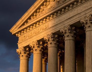 In this Oct. 10, 2017, file photo, the Supreme Court in Washington is seen at sunset. A flood of lawsuits over LGBT rights is making its way through the courts and will continue, no matter the outcome in the Supreme Court's highly anticipated decision in the case of a Colorado baker who would not create a wedding cake for a same-sex couple. (J. Scott Applewhite/AP Photo, File)