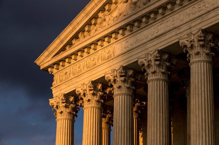 In this Oct. 10, 2017, file photo, the Supreme Court in Washington is seen at sunset. A flood of lawsuits over LGBT rights is making its way through the courts and will continue, no matter the outcome in the Supreme Court's highly anticipated decision in the case of a Colorado baker who would not create a wedding cake for a same-sex couple. (J. Scott Applewhite/AP Photo, File)