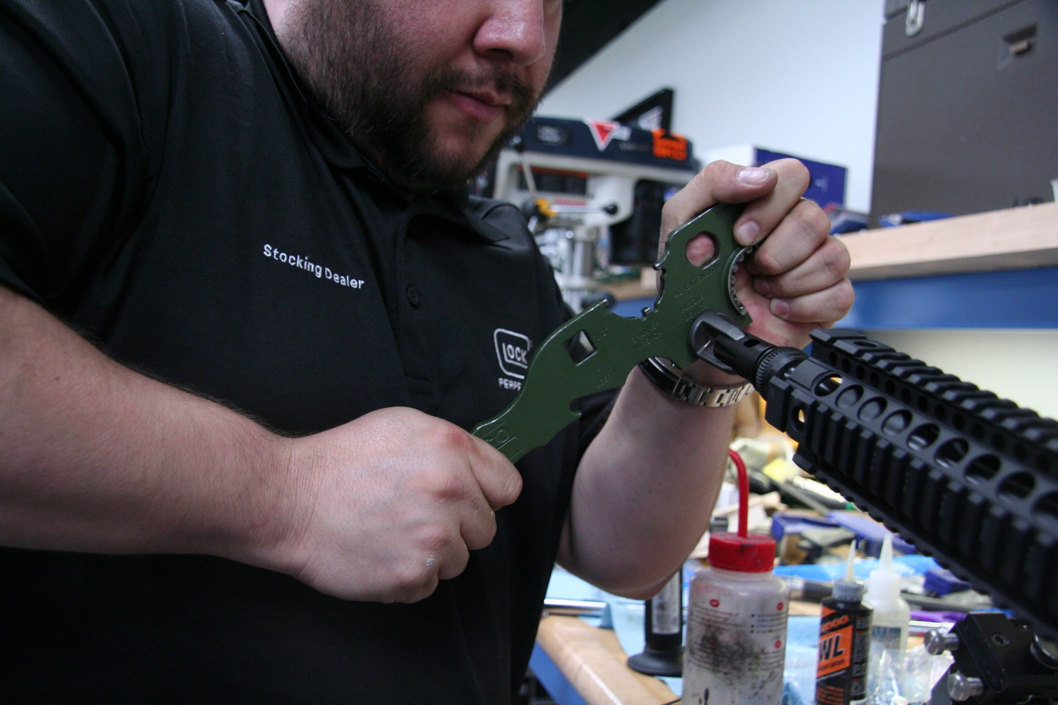 Engage Armament co owner Carlos Rabanales assemble a custom rifle. The shop had been known for customizing guns, but the smart gun flareup hurt the business. 