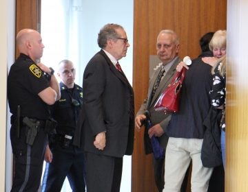 Family of Jimi Patrick, one of four men murdered by Cosmo DiNardo, leave the Bucks County Courtroom where DiNardo was sentenced to four consecutive life terms. (Emma Lee/WHYY)