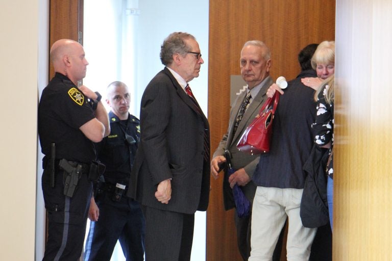 Family of Jimi Patrick, one of four men murdered by Cosmo DiNardo, leave the Bucks County Courtroom where DiNardo was sentenced to four consecutive life terms. (Emma Lee/WHYY)