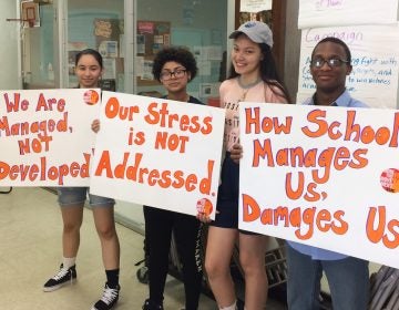 (Second from right) Yesenia Rodriguez, a 16-year-old junior at Central High School in Philadelphia, and her fellow organizers with Youth United for Change prepare to petition City Council for improvements to mental health services in schools at the School District budget hearing on Wednesday, May 16, 2018. (Nina Feldman/WHYY)