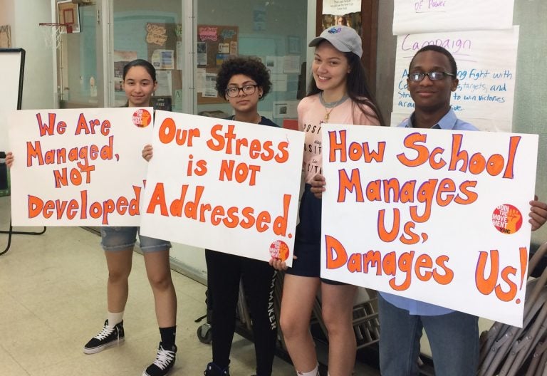 (Second from right) Yesenia Rodriguez, a 16-year-old junior at Central High School in Philadelphia, and her fellow organizers with Youth United for Change prepare to petition City Council for improvements to mental health services in schools at the School District budget hearing on Wednesday, May 16, 2018. (Nina Feldman/WHYY)