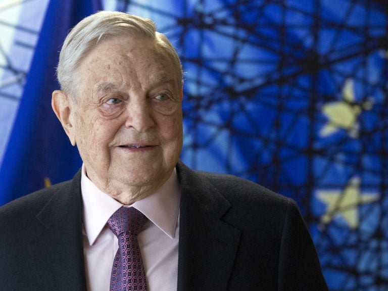 George Soros, founder and chairman of the Open Society Foundations, before the start of a meeting at EU headquarters in Brussels in 2017. (Olivier Hoslet/AP) 